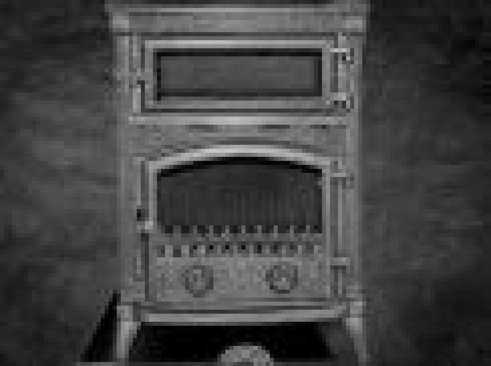 What should be considered when buying a coal stove